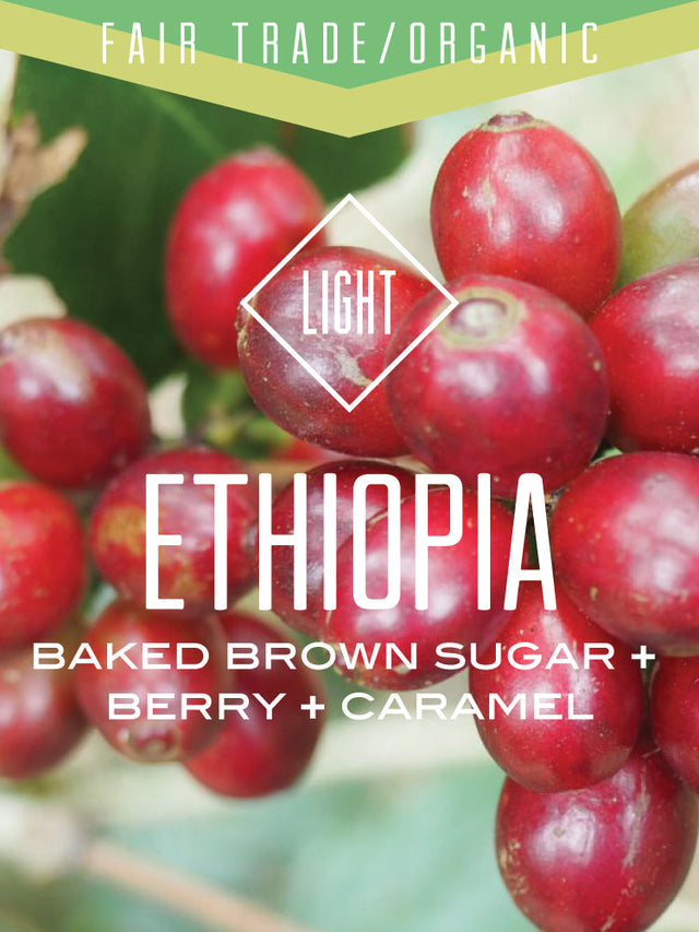 Organic Fair Trade Ethiopia Oromia Natural coffee label showing red coffee cherries and light roast notes baked brown sugar berry caramel