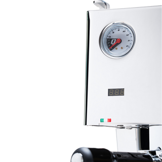 Chrome espresso machine front with round pressure gauge and digital readout Italian flag badge at the lower edge