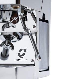 Side view of Quick Mill Pop Up espresso machine with a polished chrome panel extended lever and logo