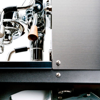Top-down close up of the Profitec JUMP with a wooden paddle and LUCCA gauge in a chrome assembly