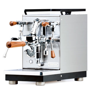 Front view of Profitec JUMP espresso machine with chrome finish dual group heads wooden handles and built in gauge