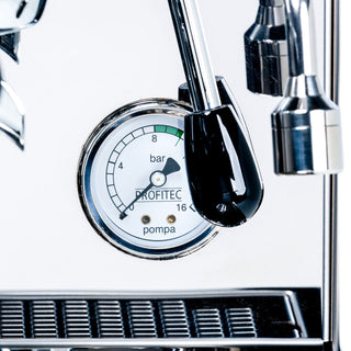 Close up of the Profitec Pro 500 PID pressure gauge with a white dial and chrome housing