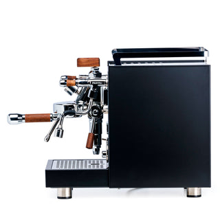 Side view of LUCCA E61 espresso machine with a black side panel and chrome group head