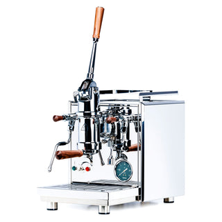 Top portion of a polished Profitec Pro 800 lever espresso machine with a wooden lever handle.
