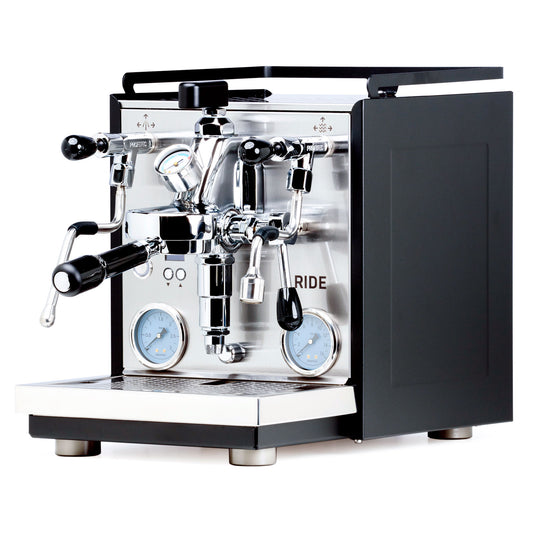 Profitec RIDE espresso machine front view with dual group heads, gauges, and chrome finish.