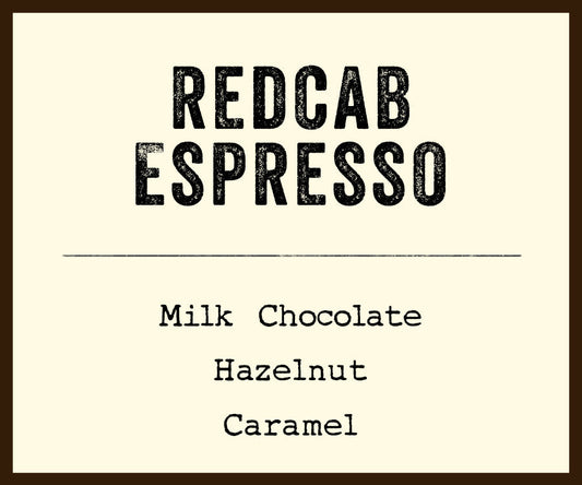 Cream label for Redcab Espresso showing Milk Chocolate Hazelnut Caramel flavor notes