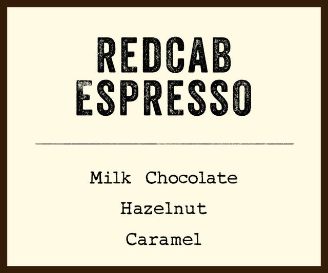 Cream label for Redcab Espresso showing Milk Chocolate Hazelnut Caramel flavor notes