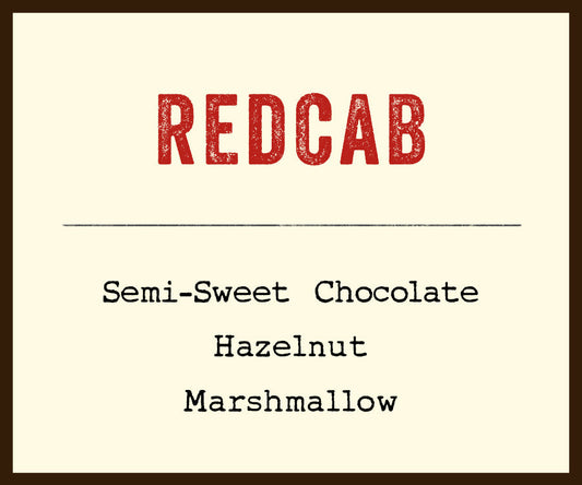 Redcab label card displaying Semi-Sweet Chocolate Hazelnut Marshmallow tasting notes on cream background