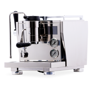 Close up of a refurbished Rocket R Nine One espresso machine with chrome housing, portafilter handle, and dual pressure gauges