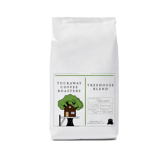 Treehouse Blend coffee bag from Tuckaway Coffee Roasters featuring a treehouse illustration on the label.