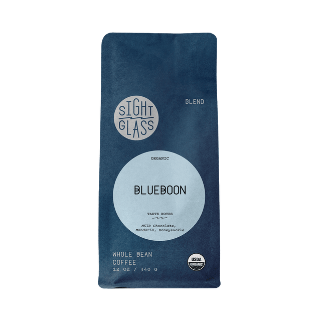 Blueboon organic whole bean coffee bag with blue packaging and large circular label