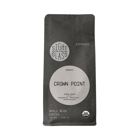 Sight Glass Crown Point espresso packaging a dark bag with a round beige label and organic seal