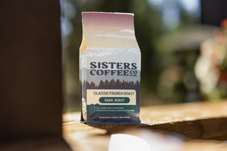 Sisters Coffee Co Classic French Roast bag with mountain sunset artwork and dark roast label