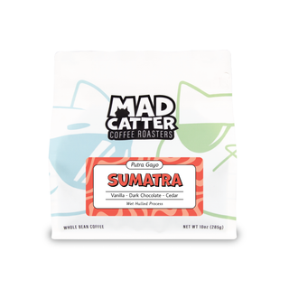 Putra Gayo Mandheling Sumatra coffee label on a white bag with a red frame and bold text.