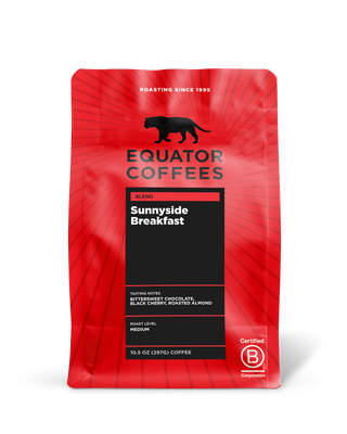 Red Sunnyside Breakfast coffee bag with black tasting notes panel and branding.