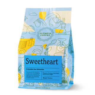 Sweetheart El Salvador Ariz Family Bourbon Natural coffee bag with blue label and whimsical blue and yellow illustration