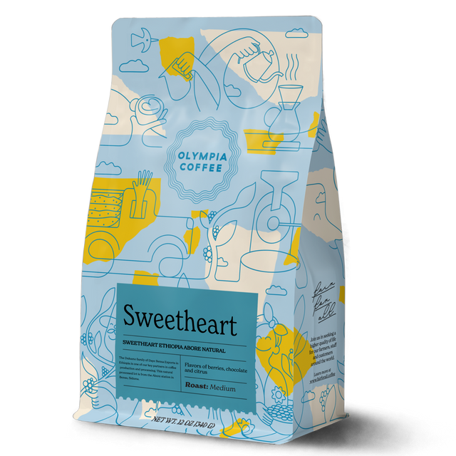 Sweetheart coffee bag with bold blue and yellow abstract artwork and a large Sweetheart label on the front