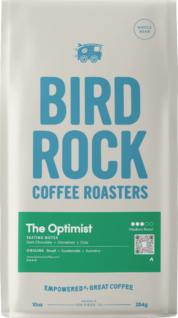 Bird Rock Coffee Roasters The Optimist whole bean bag front with bold blue lettering and green tasting notes panel.