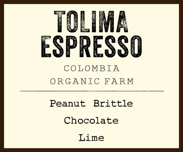 Tolima Espresso label showing Colombia organic farm branding and tasting notes peanut brittle chocolate lime
