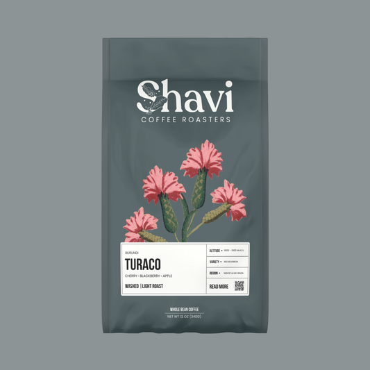 Burundi Turaco coffee bag with the Shavi Coffee Roasters logo and pink flower artwork.