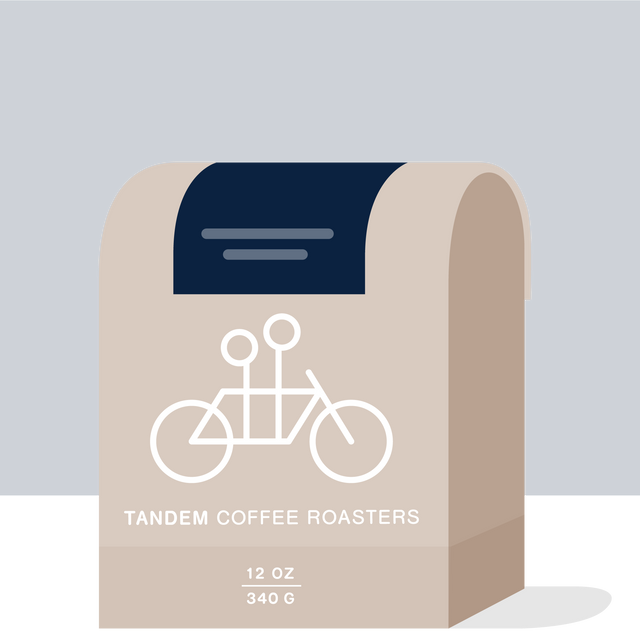 West End Blues coffee packaging with navy backdrop beige curves and Tandem Coffee Roasters branding