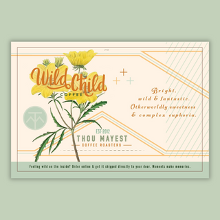 Wild Child coffee bag with botanical yellow flower artwork displayed front and center on a shelf.