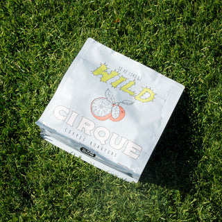 Cirque Coffee Roasters Wild bag on green grass outdoors