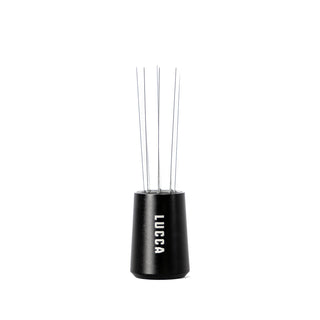 LUCCA WDT Tool with eight stainless steel needles extending from a black handle.