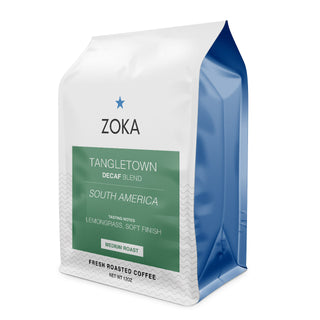 Zoka Tangletown Decaf Blend coffee bag front view with green label on white packaging