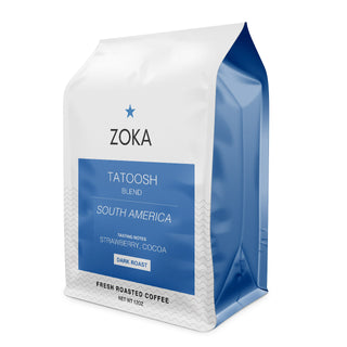 Zoka Tatoosh dark roast coffee bag with a white top and blue label on a white background.