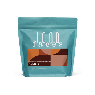 Aldo's by 1000 Faces coffee bag in turquoise with a retro brown label.