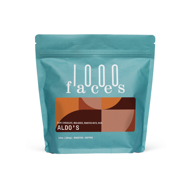Aldo's by 1000 Faces coffee bag in turquoise with a retro brown label.
