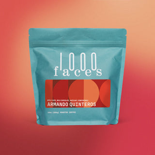 Teal Armando Quinteros coffee bag on a warm orange to red gradient background with a red label and circular design.