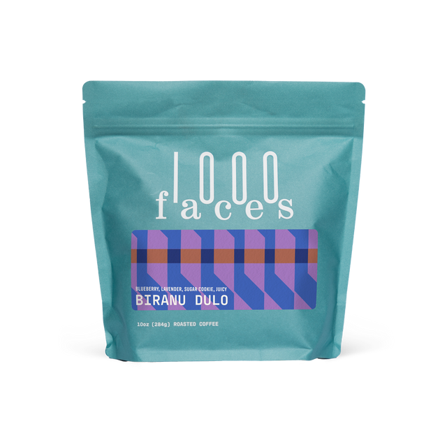 Biranu Dulo Ethiopian coffee bag by 1000 Faces with teal bag and decorative label