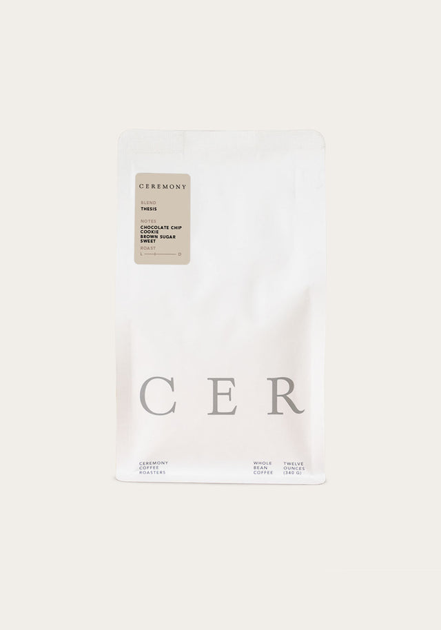 White Ceremony Coffee Roasters bag for Thesis with a beige tasting notes label