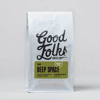 White stand up bag of Good Folks Coffee Deep Space dark roast blend with an olive green label