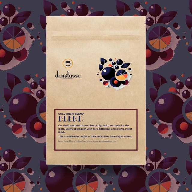 Demitasse Cold Brew Blend bag with abstract geometric artwork and blue orange accents