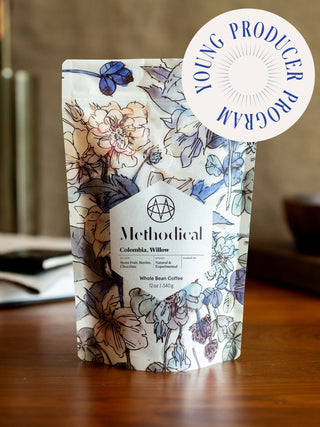 Methodical Colombia Willow coffee bag with floral artwork and a Young Producer Program sticker.