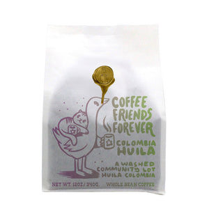 White coffee bag with a playful bird illustration and Coffee Friends Forever Colombia Huila branding