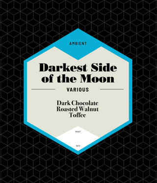 Darkest Side of the Moon coffee bag featuring a hexagonal label with blue border against a dark patterned bag.