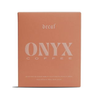 Decaf Colombia Inzá San Antonio coffee box in warm peach with ONYX branding