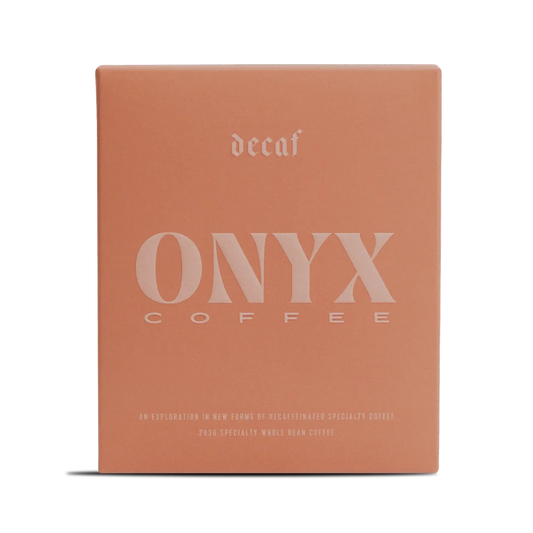 Decaf Colombia Inzá San Antonio coffee box in warm peach with ONYX branding