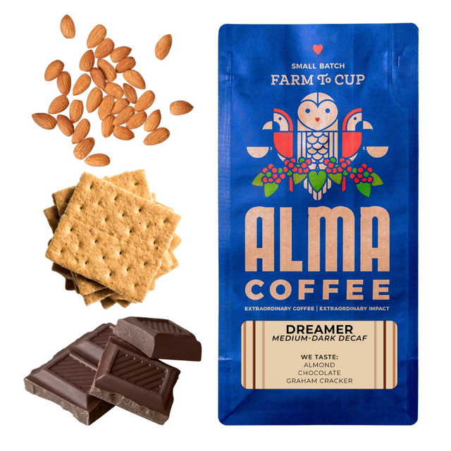 Alma Coffee Dreamer decaf bag in blue with almonds crackers and chocolate beside