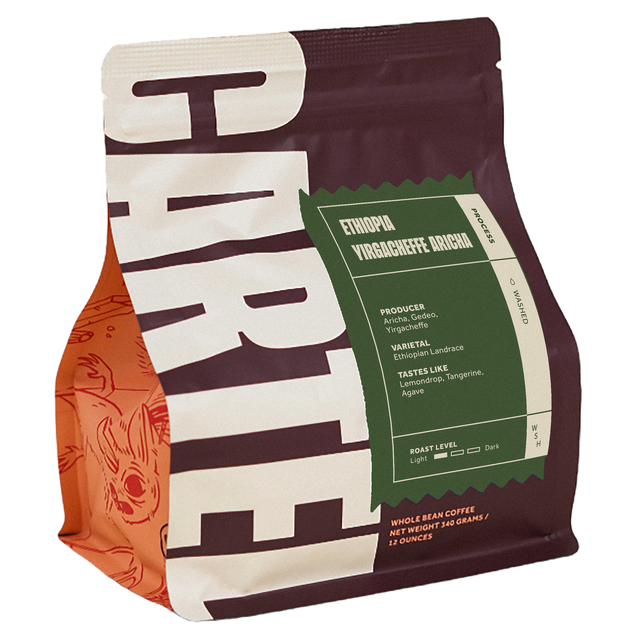Colombia Finca Chambaku coffee bag with bold typography and a green Ethiopian label accent