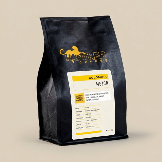 Panther Coffee Mejor Colombia bag with bold yellow logo and white origin label.