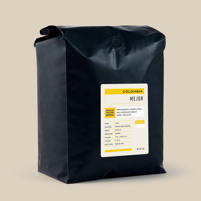 Mejor Colombia coffee bag from Panther Coffee, close up of the white label on a black bag.