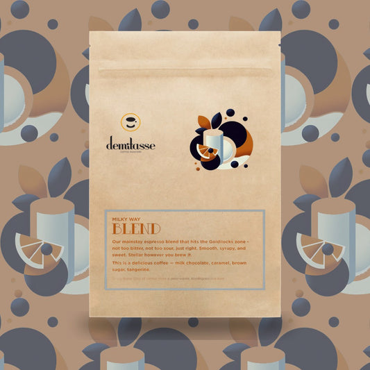 Demitasse Milky Way Blend coffee bag with abstract geometric artwork and Demitasse logo.