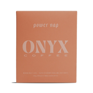 Orange Power Nap coffee box with white branding