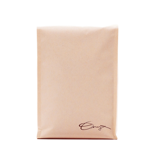 White Geometry coffee bag with subtle tan text across the front
