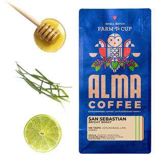 San Sebastián Bright Roast bag beside honey, rosemary sprigs and a lime wedge.